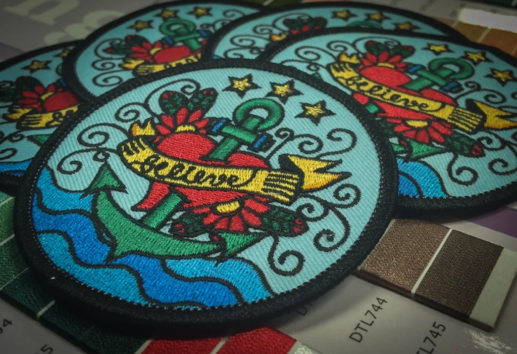 Custom embroidered patches close-up showing premium stitching detail and production quality