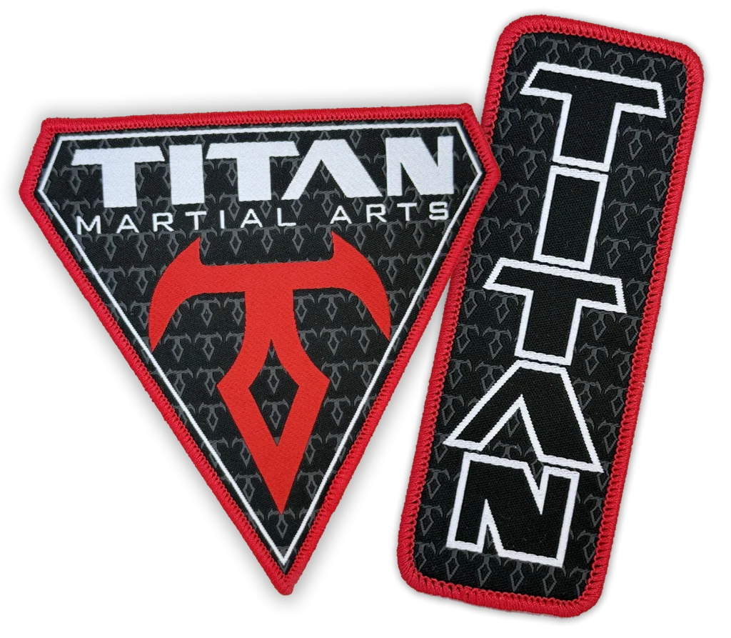 Custom woven Titan Martial Arts patches with merrowed red borders