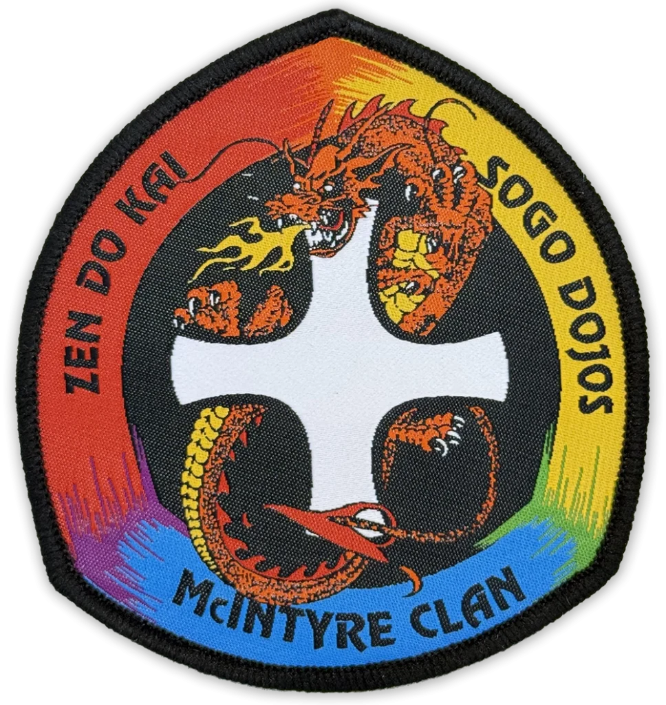 Custom woven martial arts badge for Zen Do Kai Sogo Dojo featuring detailed dragon design with rainbow border and McIntyre Clan text